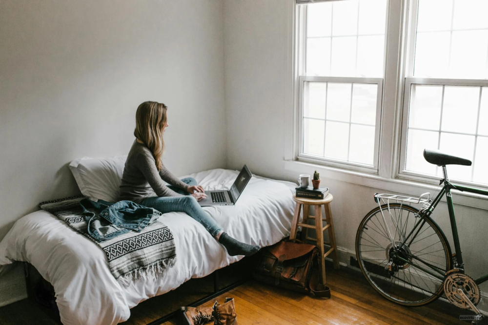 a bedroom with windows