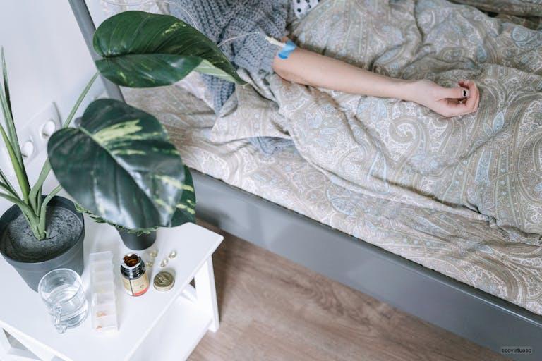 Bedside Table with Green Plant and Medicines